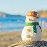 Snowman built on a beach